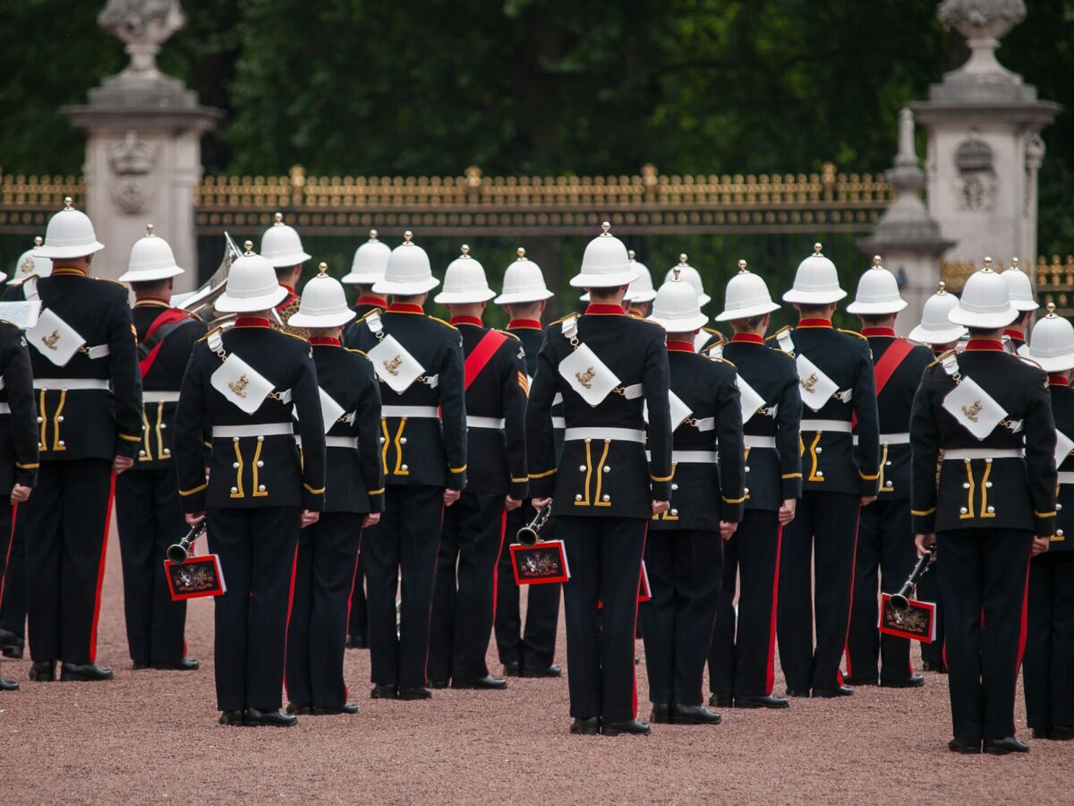 a group of men in uniform standing next to each other