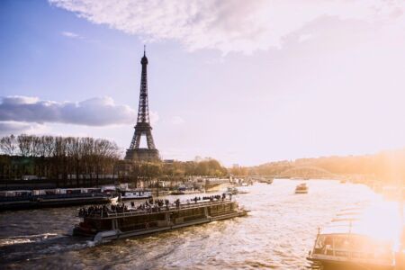 eiffel tower near body of water during daytime